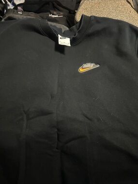 Nike Black Crewneck Sweatshirt with Yellow-Orange Gradient Swoosh